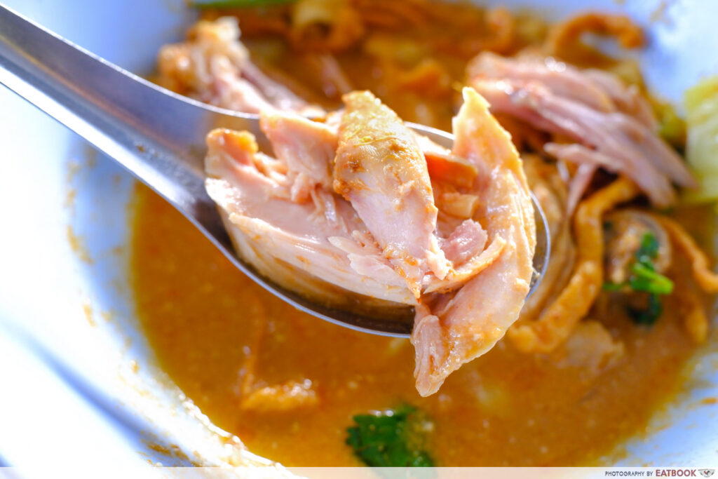 khao soi mae sai chicken closeup meat