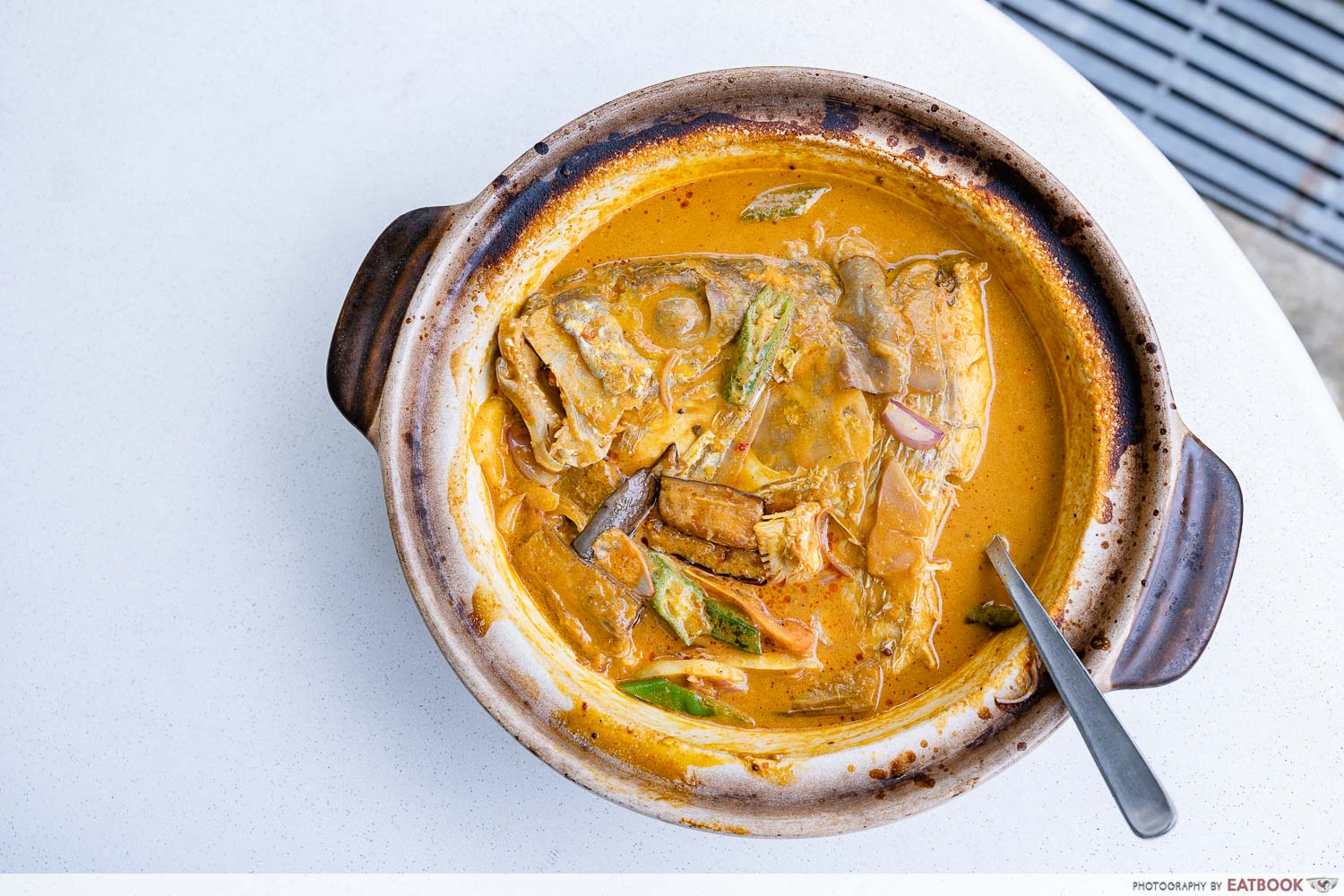 ocean curry fish head flatlay