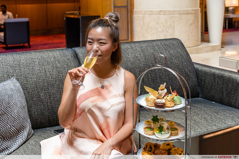 marriott msw high tea - drinking champagne