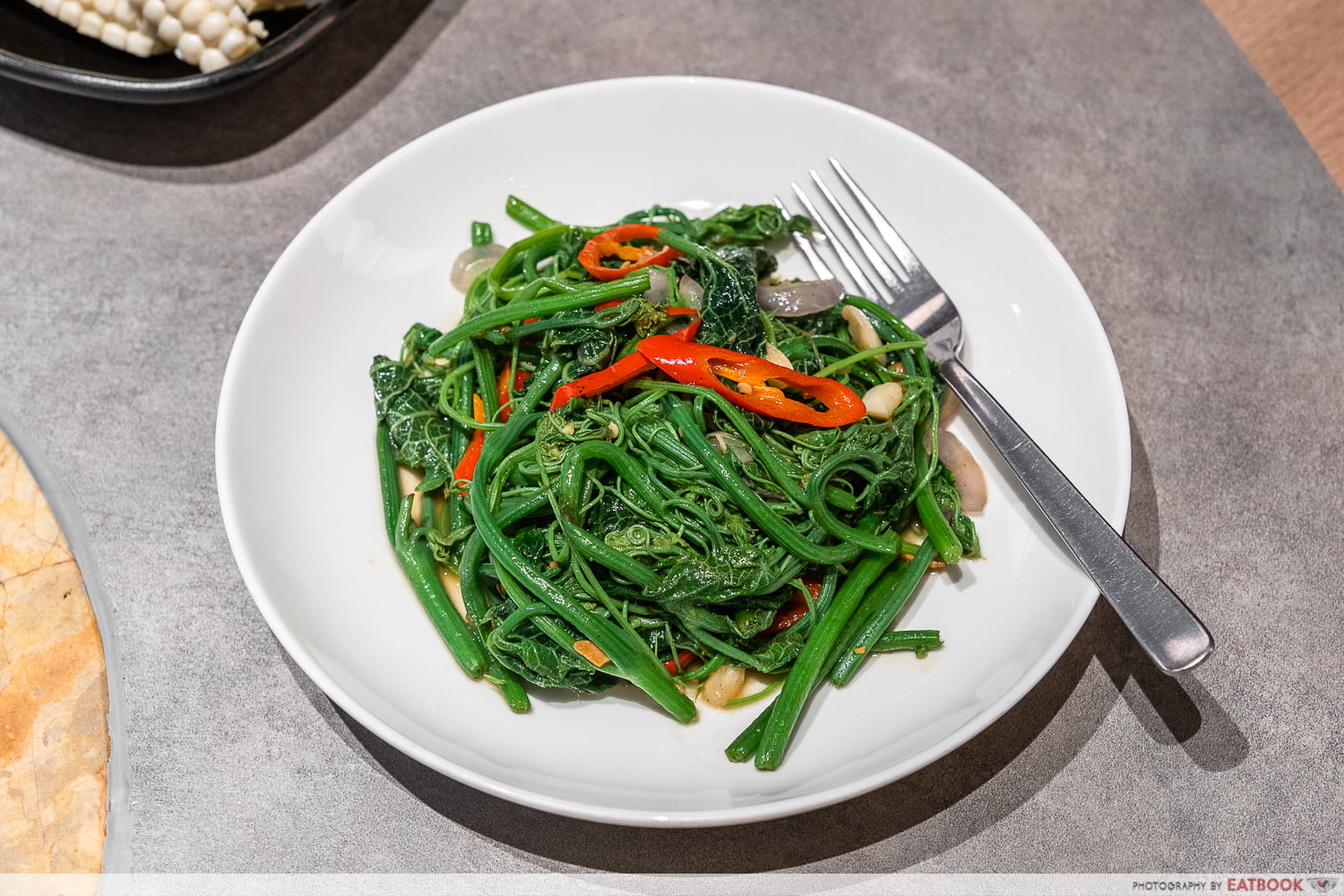 yun nans stonepot fish - chayote leaves