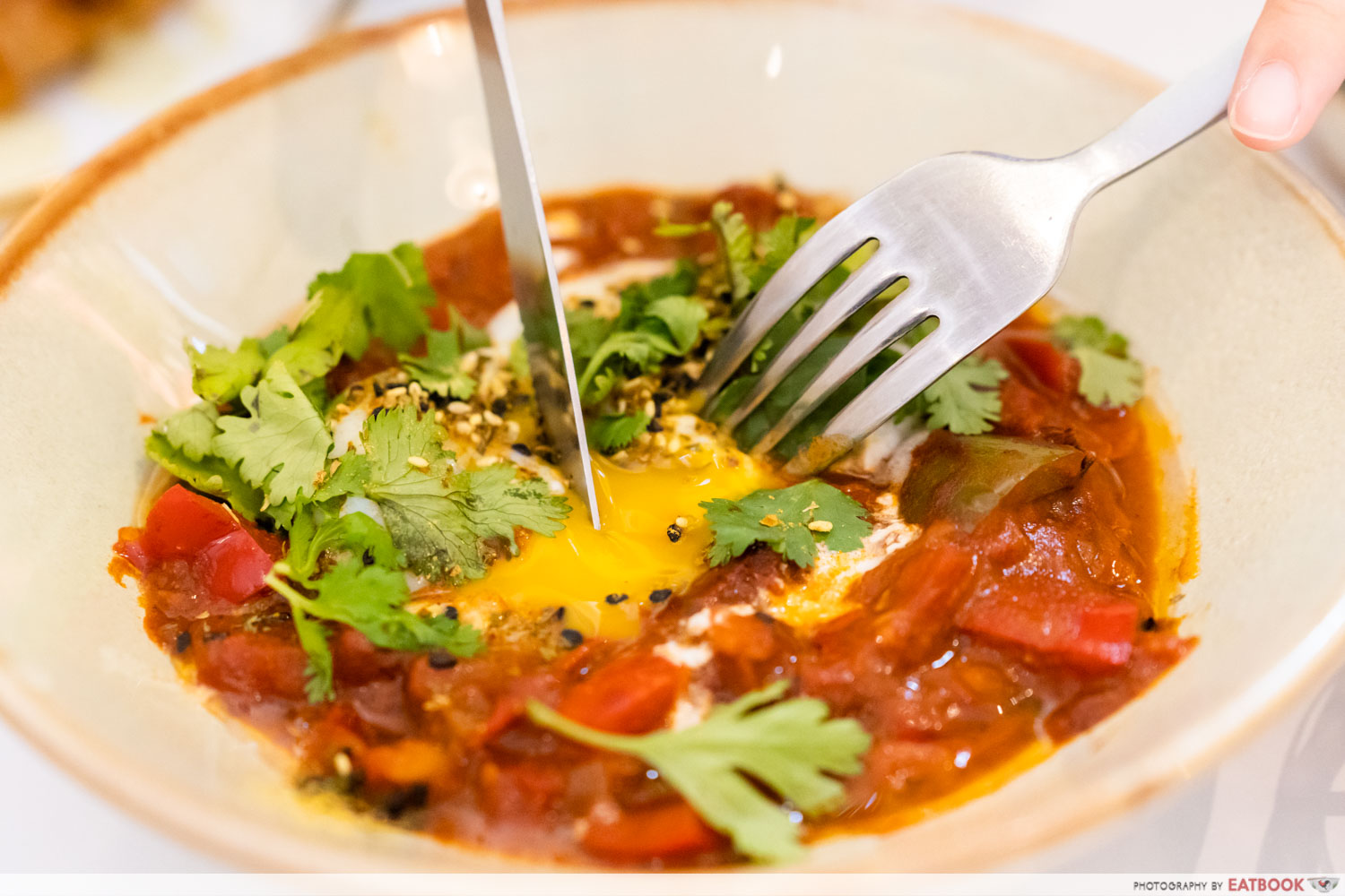 shakshuka-yolk-break-shot