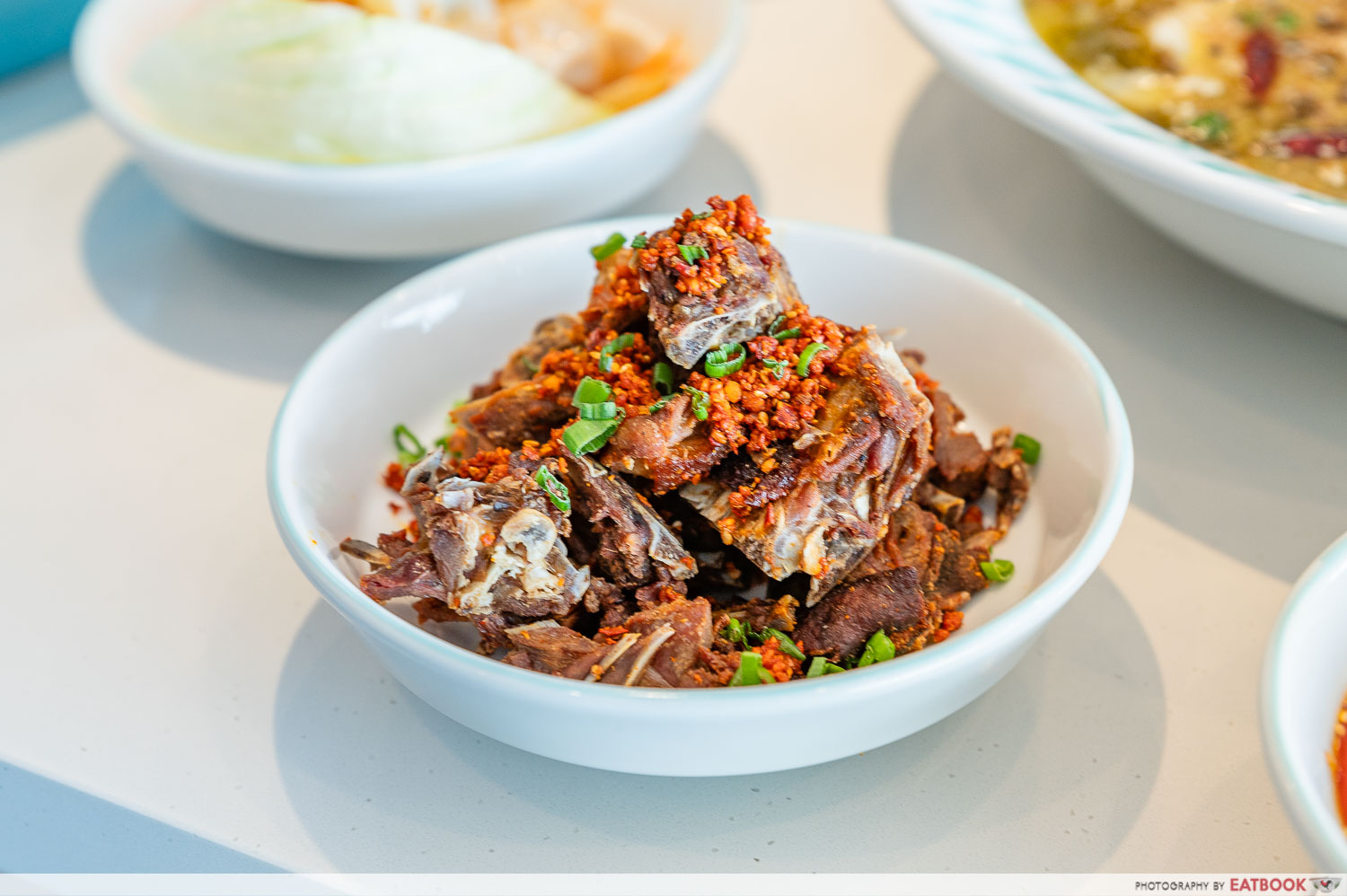 yao yao sauerkraut fish - garlic and sichuan pepper duck