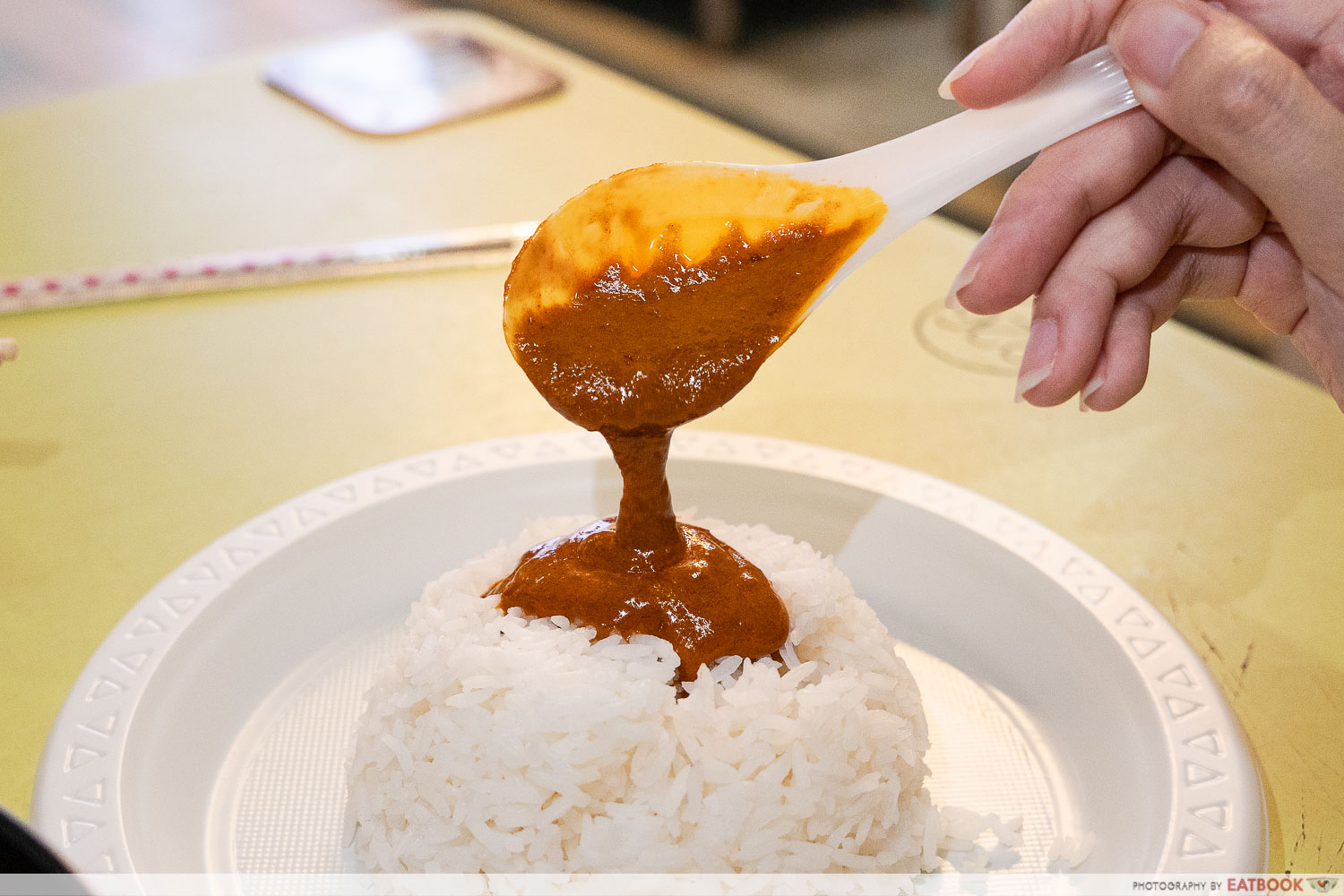curry-pour-on-rice-spoon
