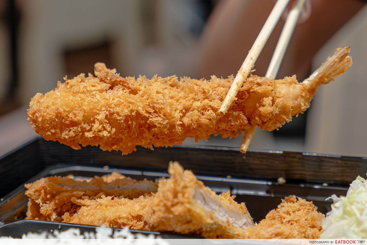 fried-ebi-shrimp-holding-chopsticks
