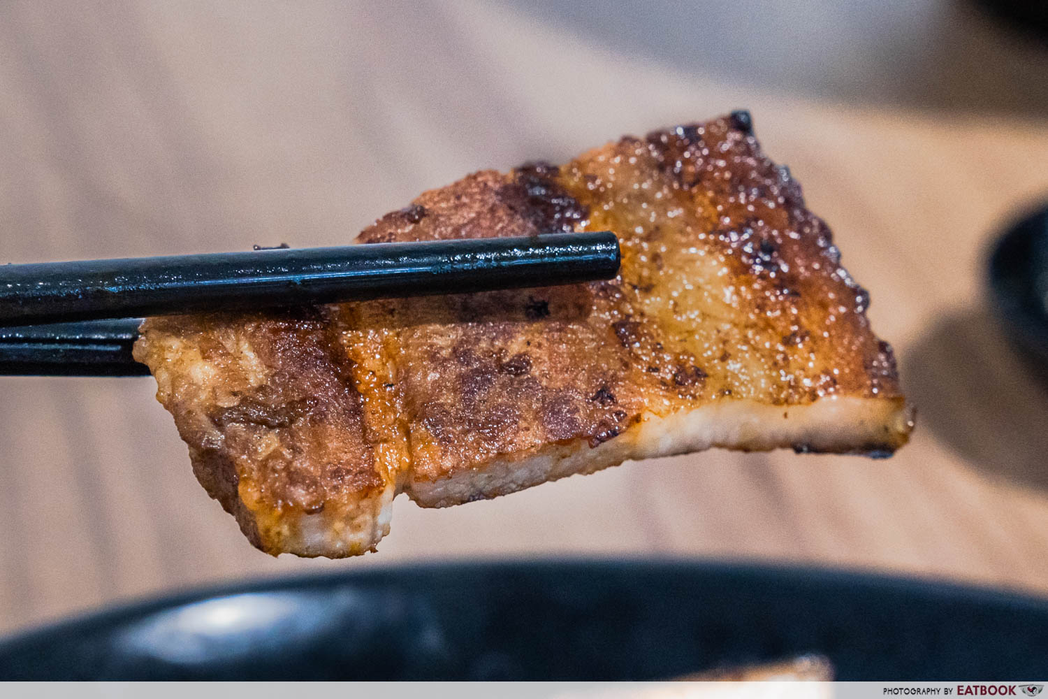 marinated-pork-chopsticks-closeup