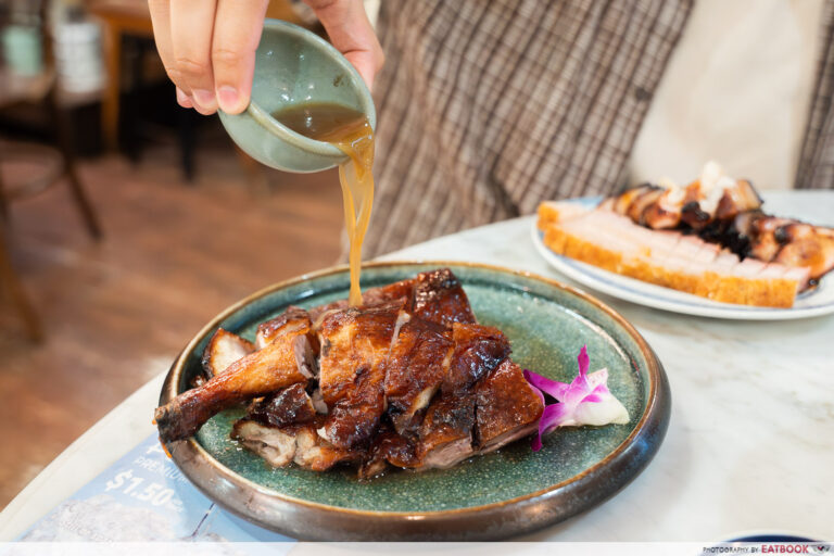 laifaba-wood-fired-roasted-london-duck-lower-rack-gravy-pour-interaction