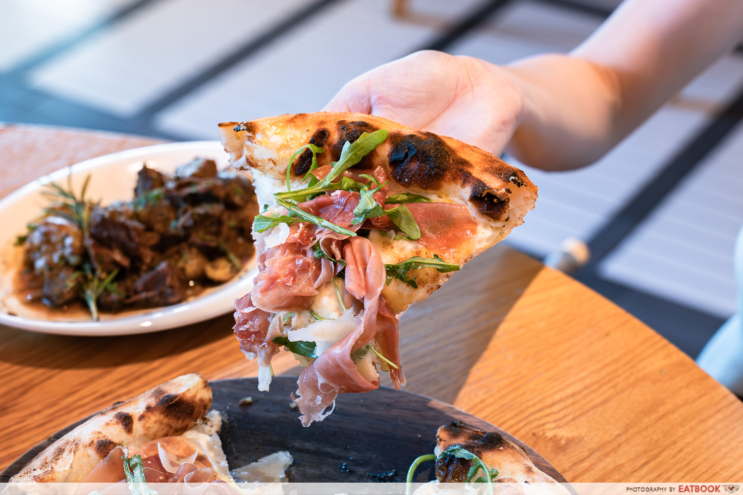 casa-vostra-parma-ham-fig-pizza-slice