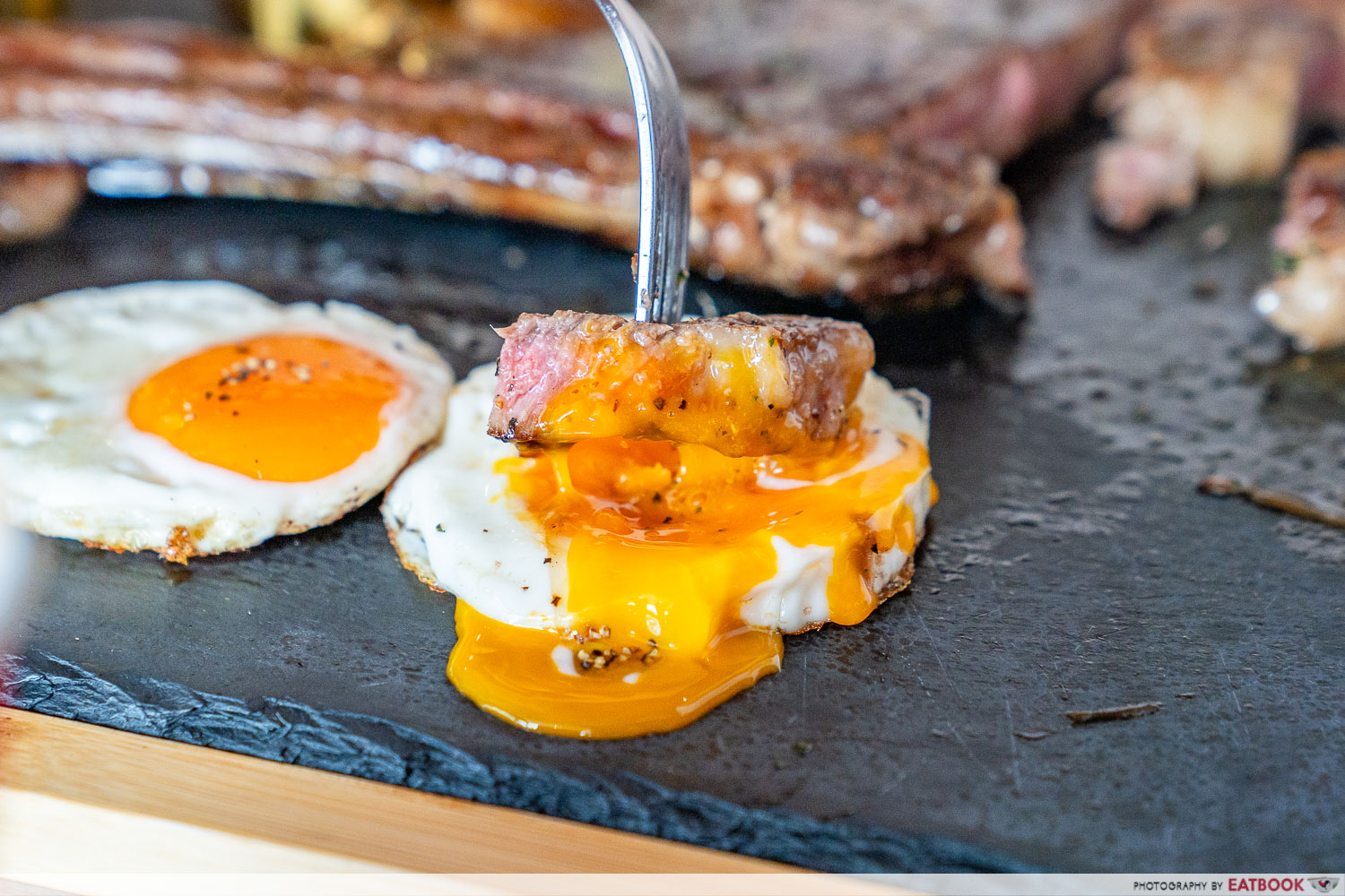 Tomahaw-King-Steakhouse-and-Grill-yolk-and-steak