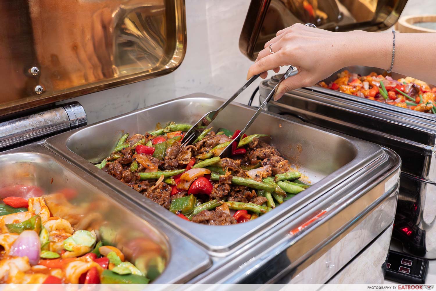 nyonyas and gentlemen buffet interaction shot