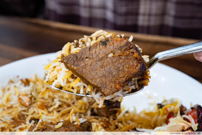 cilantro-the-biryani-club-wagyu-brisket-biryani-spoon-interaction