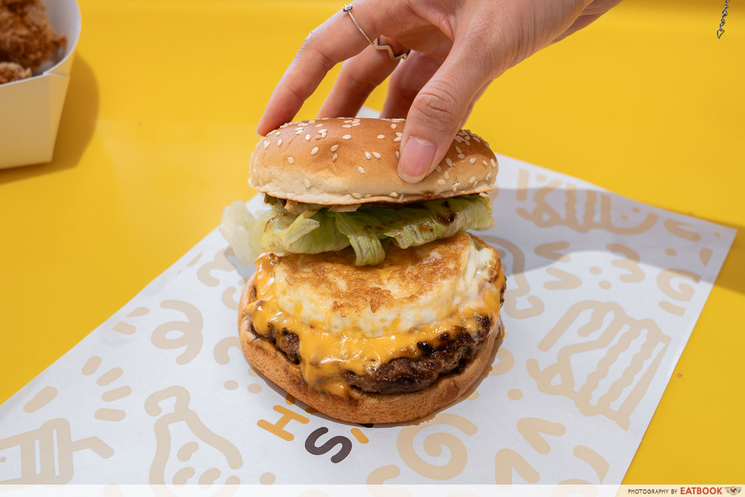Angus beef burger interaction shot
