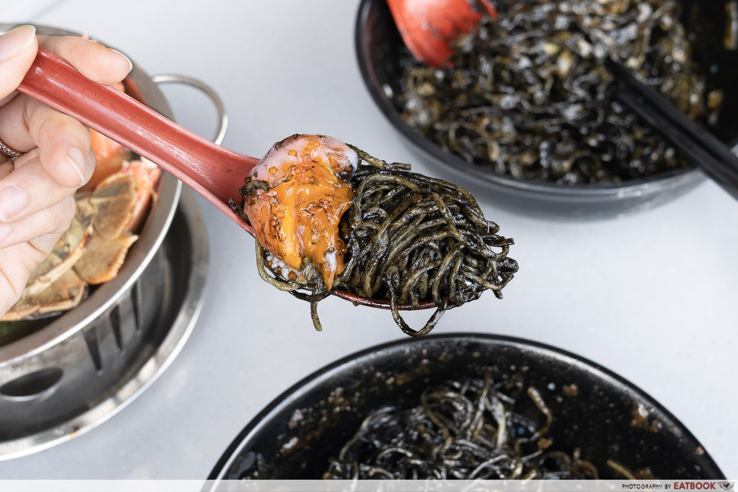 squid ink pasta interaction shot